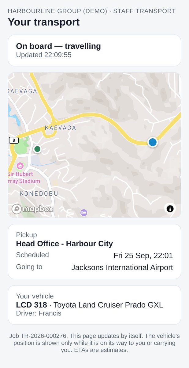 A passenger's phone page showing they are on board and travelling, with the vehicle on a map and the destination.